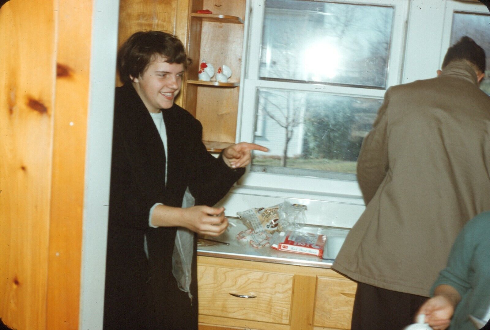 1961 Young Woman Pointing Walking Through Kitchen 60s Vintage 35mm Slide