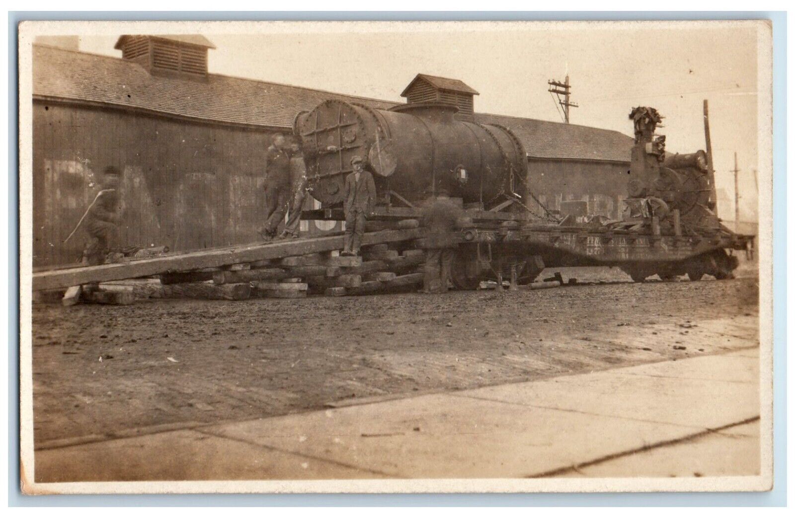 c1910\'s Railroad Workers Unloading Boiler Occupational RPPC Photo Postcard