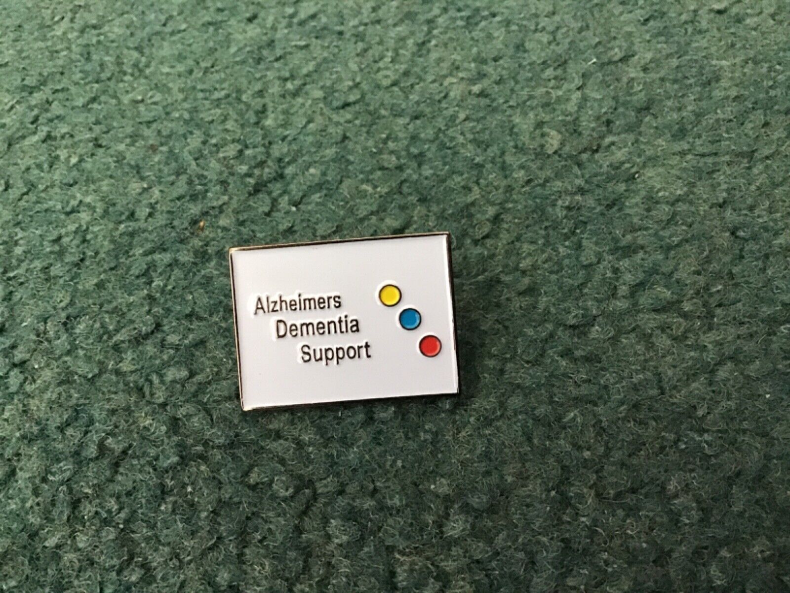 Charity Pin Badge for Alzheimer’s Dementia Support.