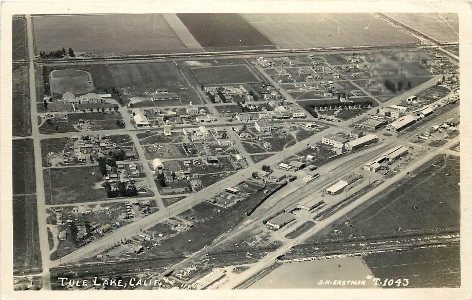 RPPC Air View of Tule Lake CA Hwy 139 Modoc County, Eastman T-1043,1940s
