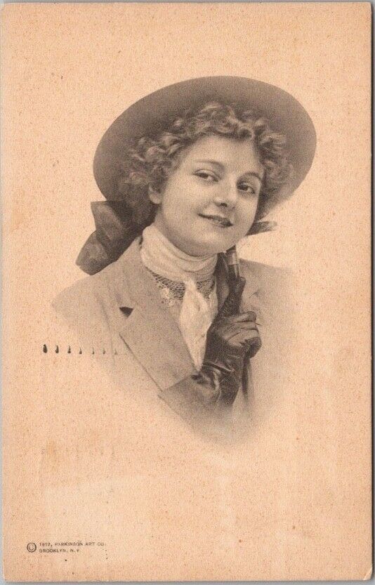 1913 Pretty Lady Greetings Postcard Girl with Riding Crop / PARKINSON ART CO.