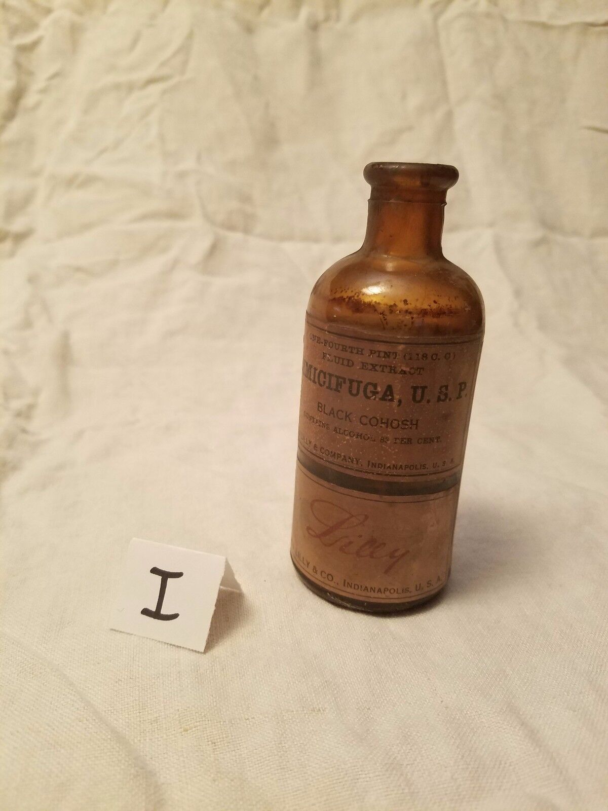 Vintage amber Eli Lilly Cimicifuga U.S.P. Black Cohosh apothecary bottle