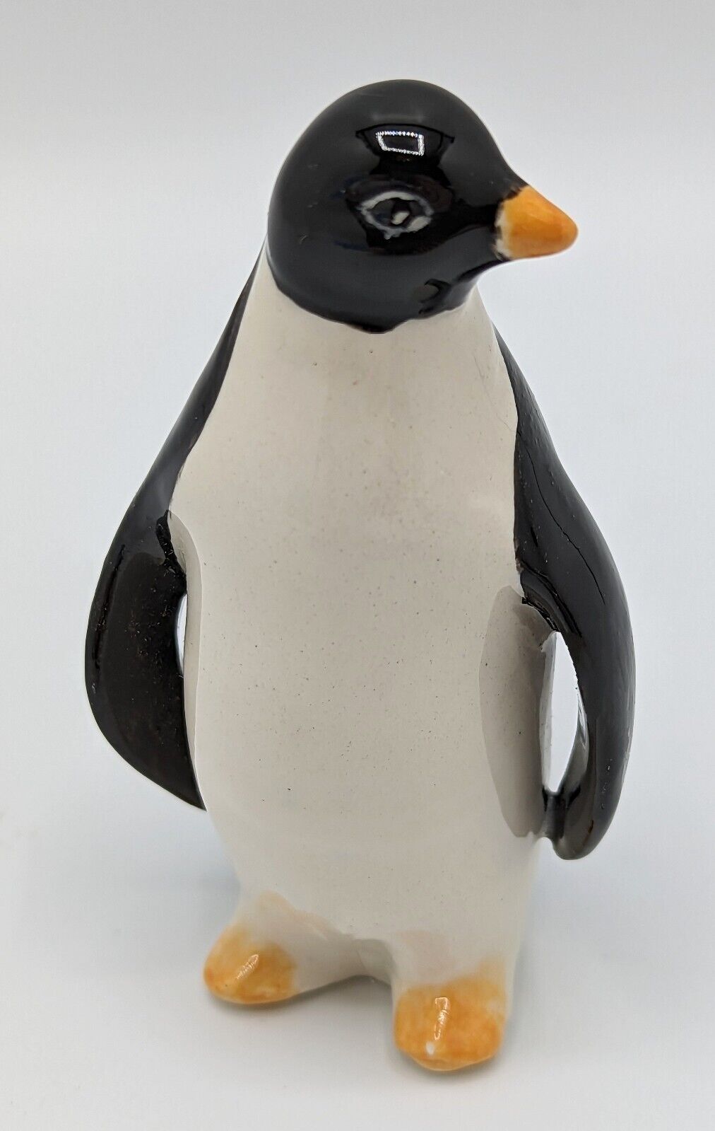 Porcelain Penguin Figurine Hand Painted 2.75 in Yellow Feet Black Head