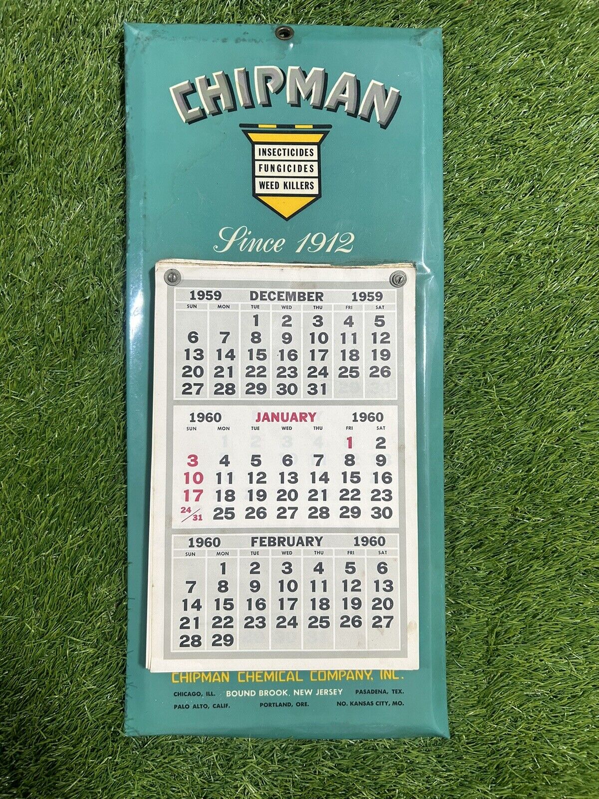 Vintage “Chipman Chemical Company” metal sign with Paper Calendar 1960-1971.