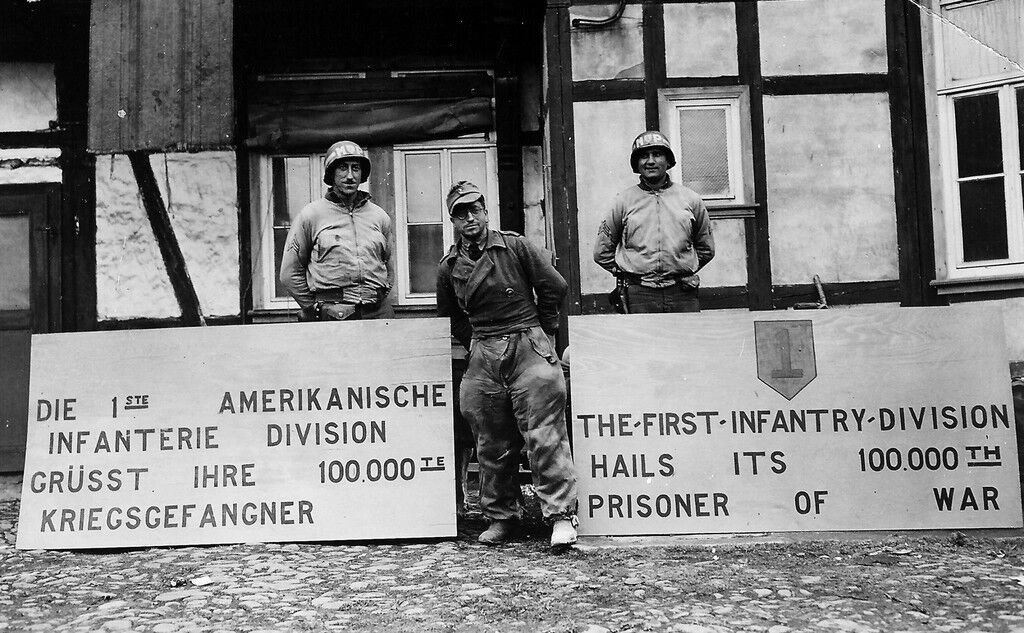 WWII B&W Photo US 1st Infantry Division 100,000th German POW WW2  / 1255
