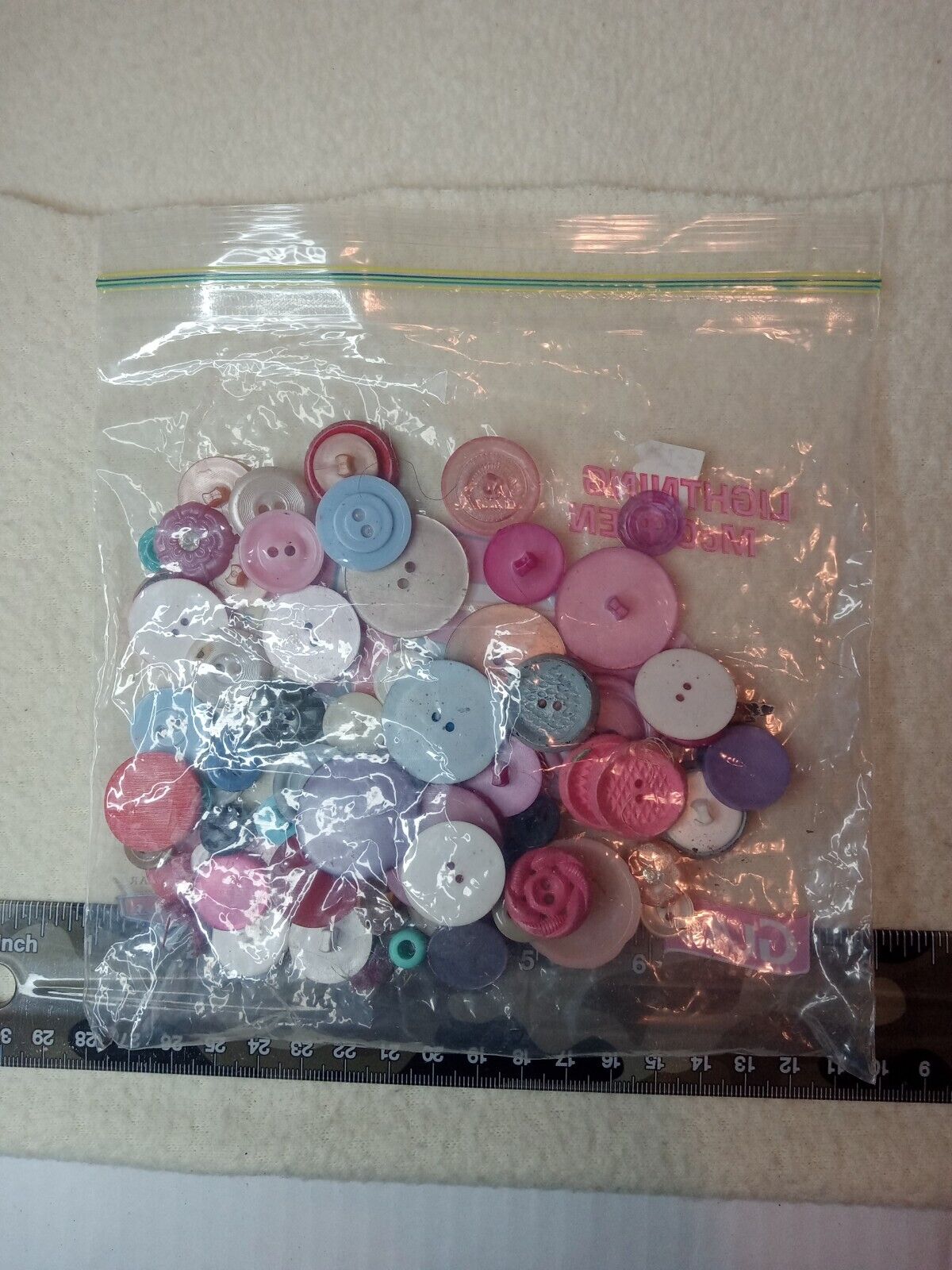 Bag of mixed buttons, all colors, sandwich bag size, mostly two hole