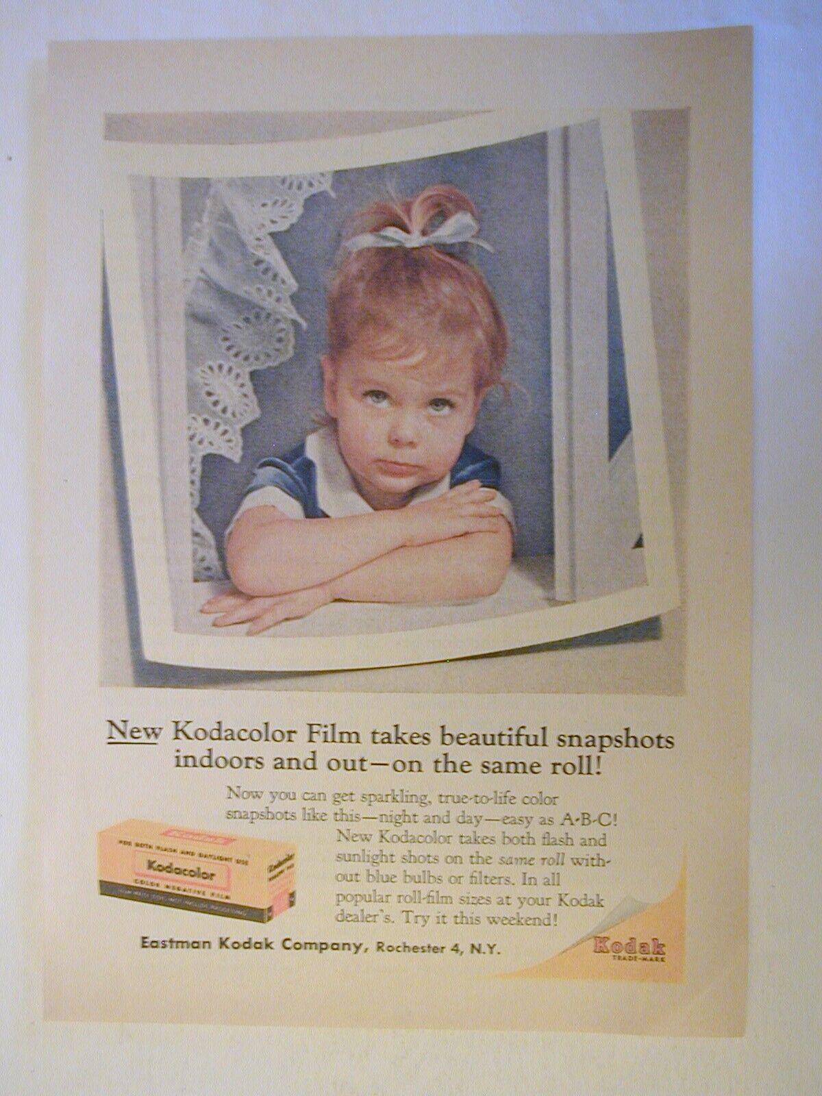 1956 KODAK KODACOLOR FILM TODDLER WITH ARMS CROSSED 5.25X7.5 PRINT AD 51