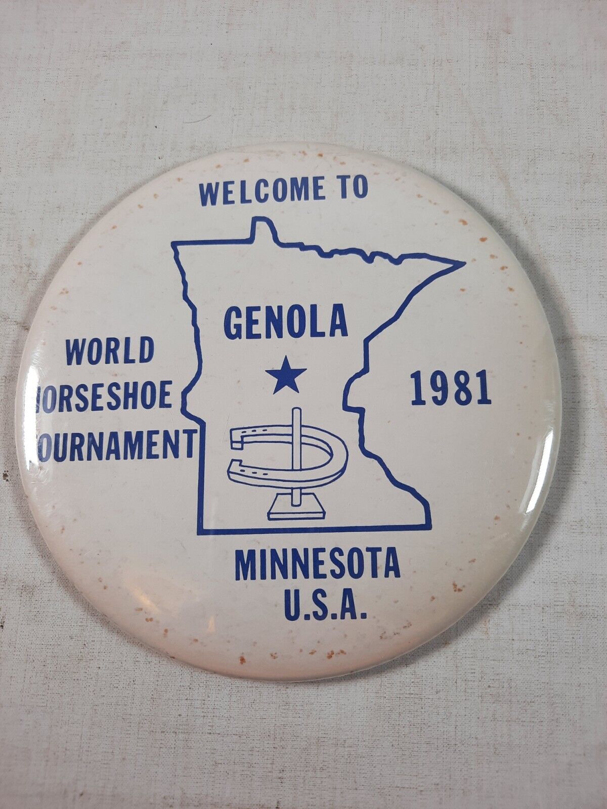 Welcome To Genola Minnesota 1981 World Horseshoe Tournament. Pin back  