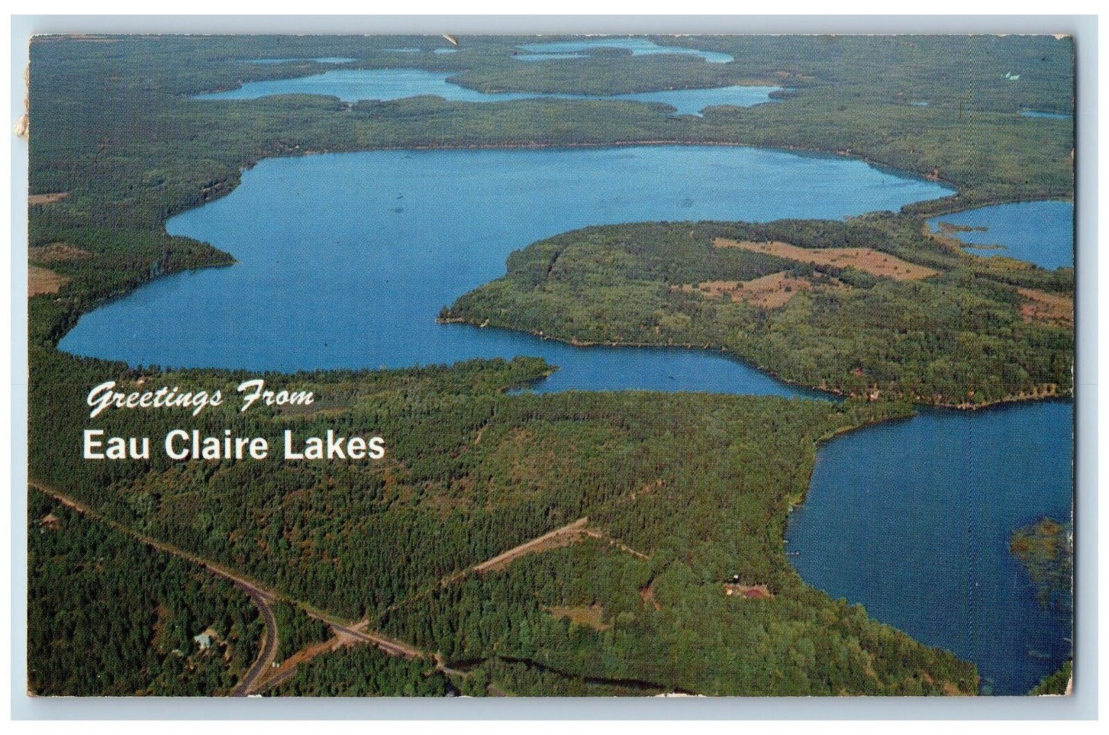 Madison Nebraska NE Postcard Greetings Aerial View Of Lower Eau Claire Lake 1981