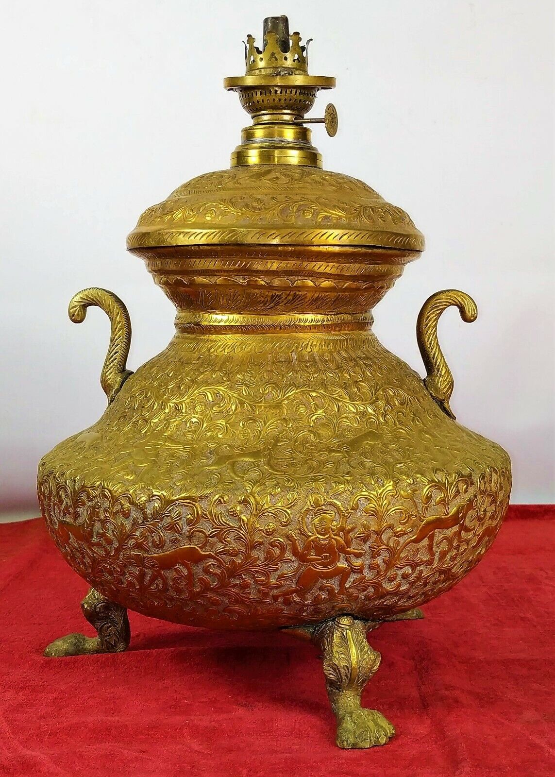 LARGE MUGHAL STYLE JAR, TRANSFORMED INTO QUINQUÉ. CHISELED BRONZE. INDIA. XIX-XX