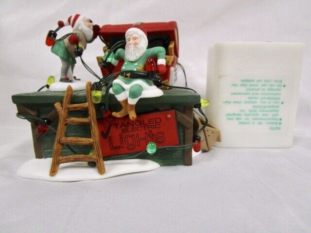 Department 56  Heritage Village  -  UNTANGLE THE CHRISTMAS LIGHTS   -  In Box