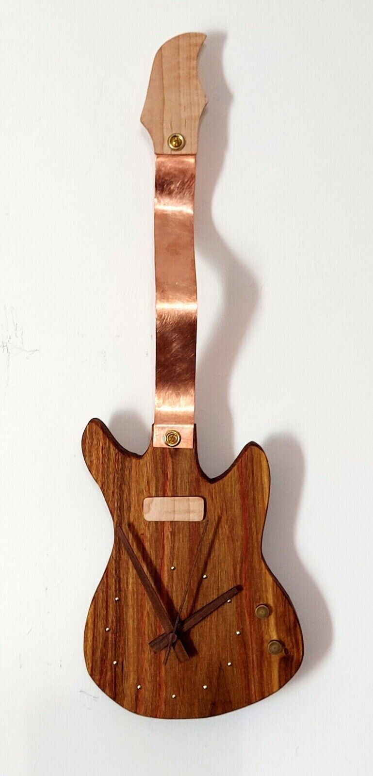 Guitar Wall Clock uses Unique handmade exotic hardwood Canary Wood for the body