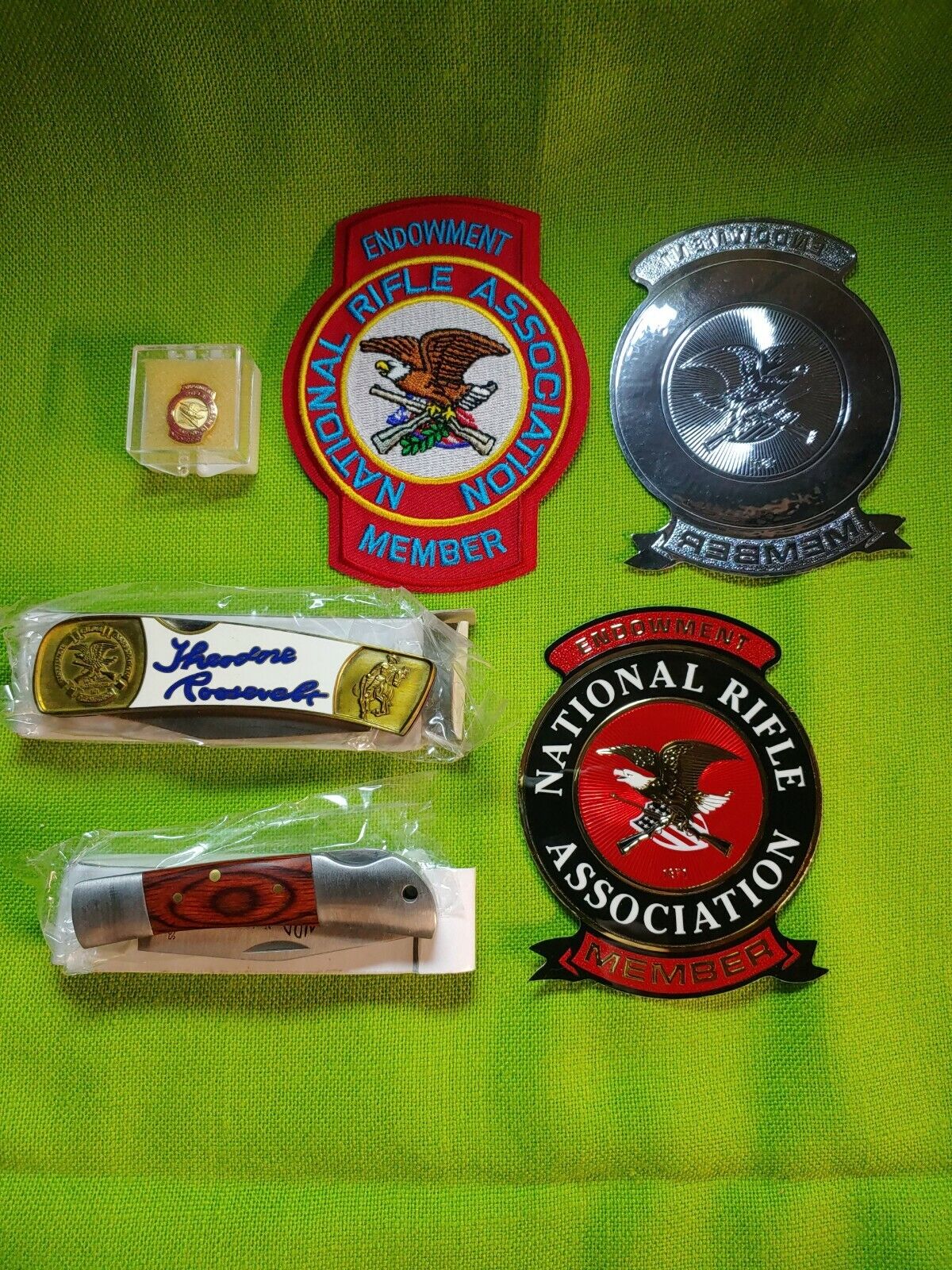 Nice Lot Of NRA NEW 6pc. Patch’s, Pins, Knife. I5