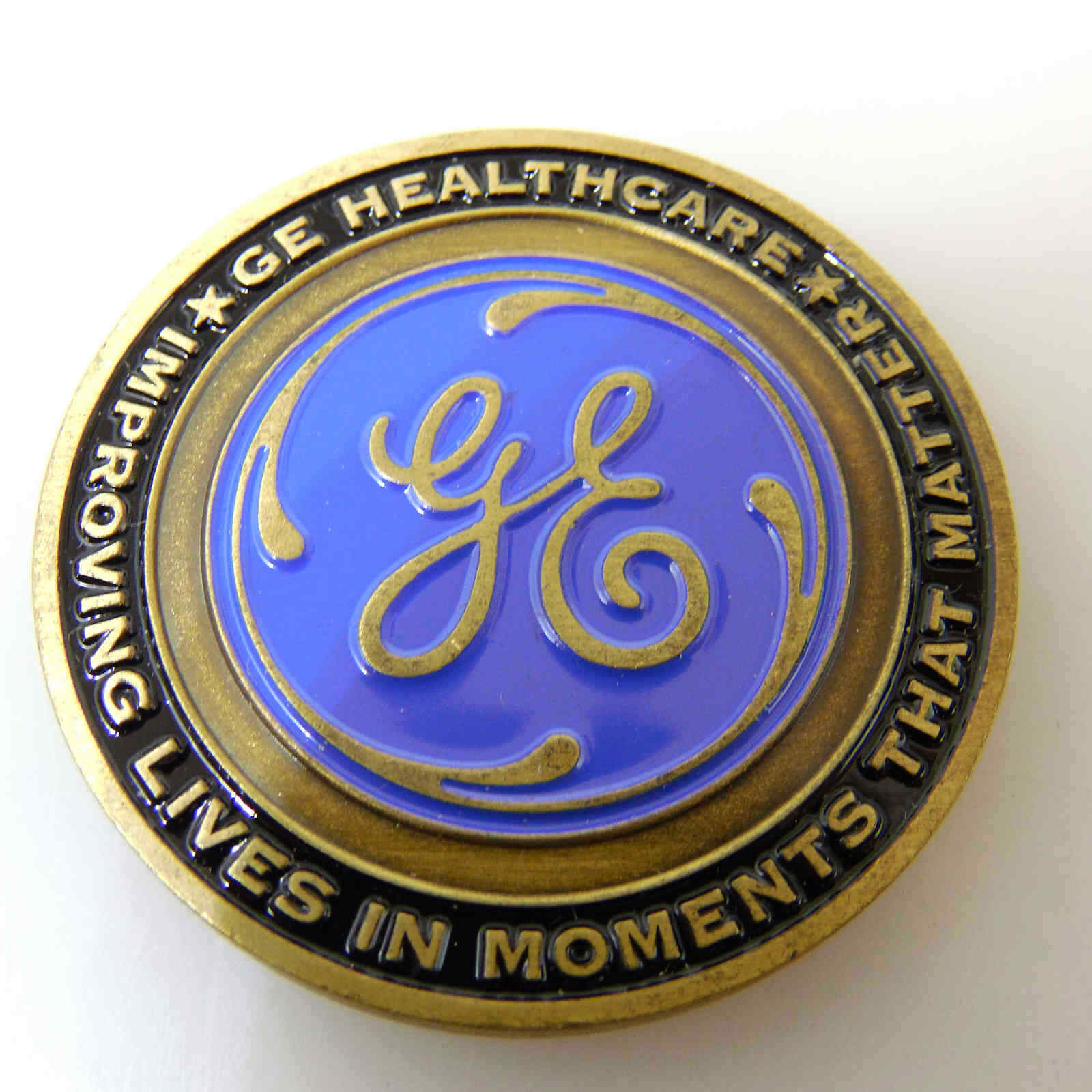 USCAN DISTINGUISHED SERVICE GE HEALTHCARE CHALLENGE COIN