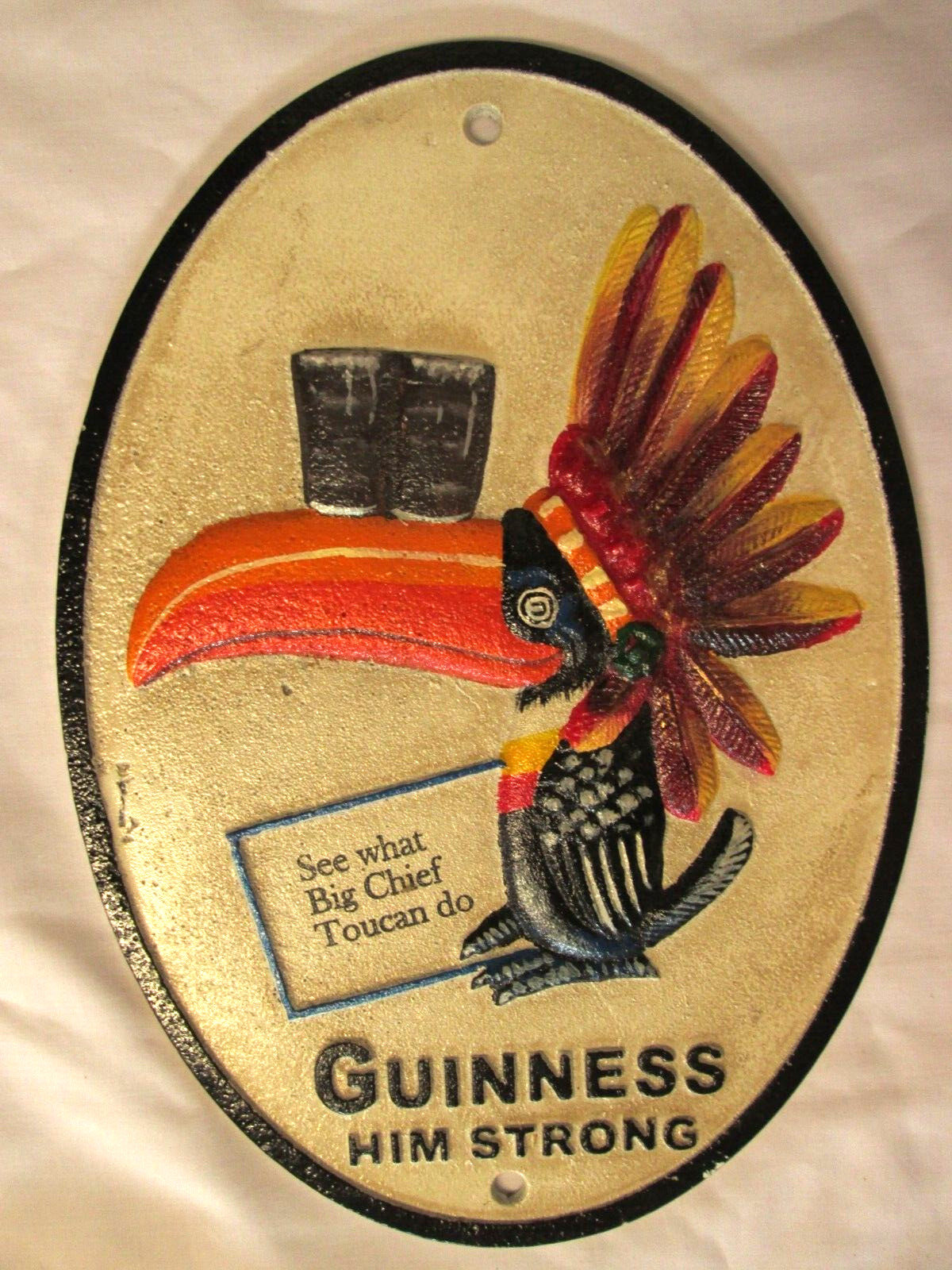 GUINNESS ~ Him Strong, Big Chief Toucan Do, Cast Iron Oval Beer Sign, 11” x 8”