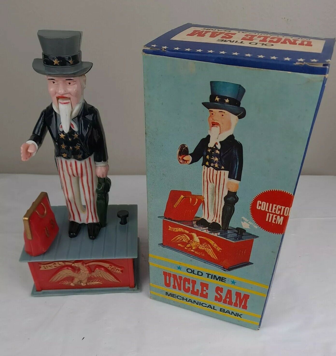 1975 Old Time Uncle Sam Mechanical Coin Bank. New. Original Box. Works Plastic