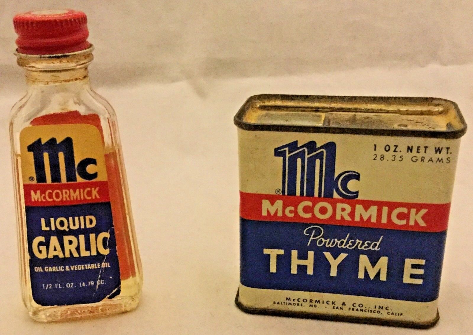 Vintage McCormick Powdered Thyme Tin 1 oz and Liquid Garlic 1/2 oz Almost Full