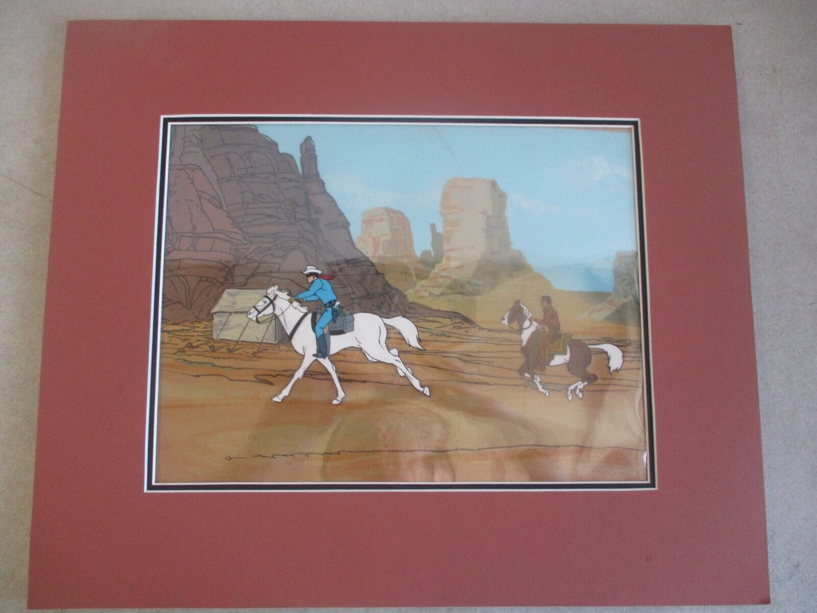 LONE RANGER ANIMATION CEL WITH TONTO AND PAINTED BACKGROUND ORIGINAL ART
