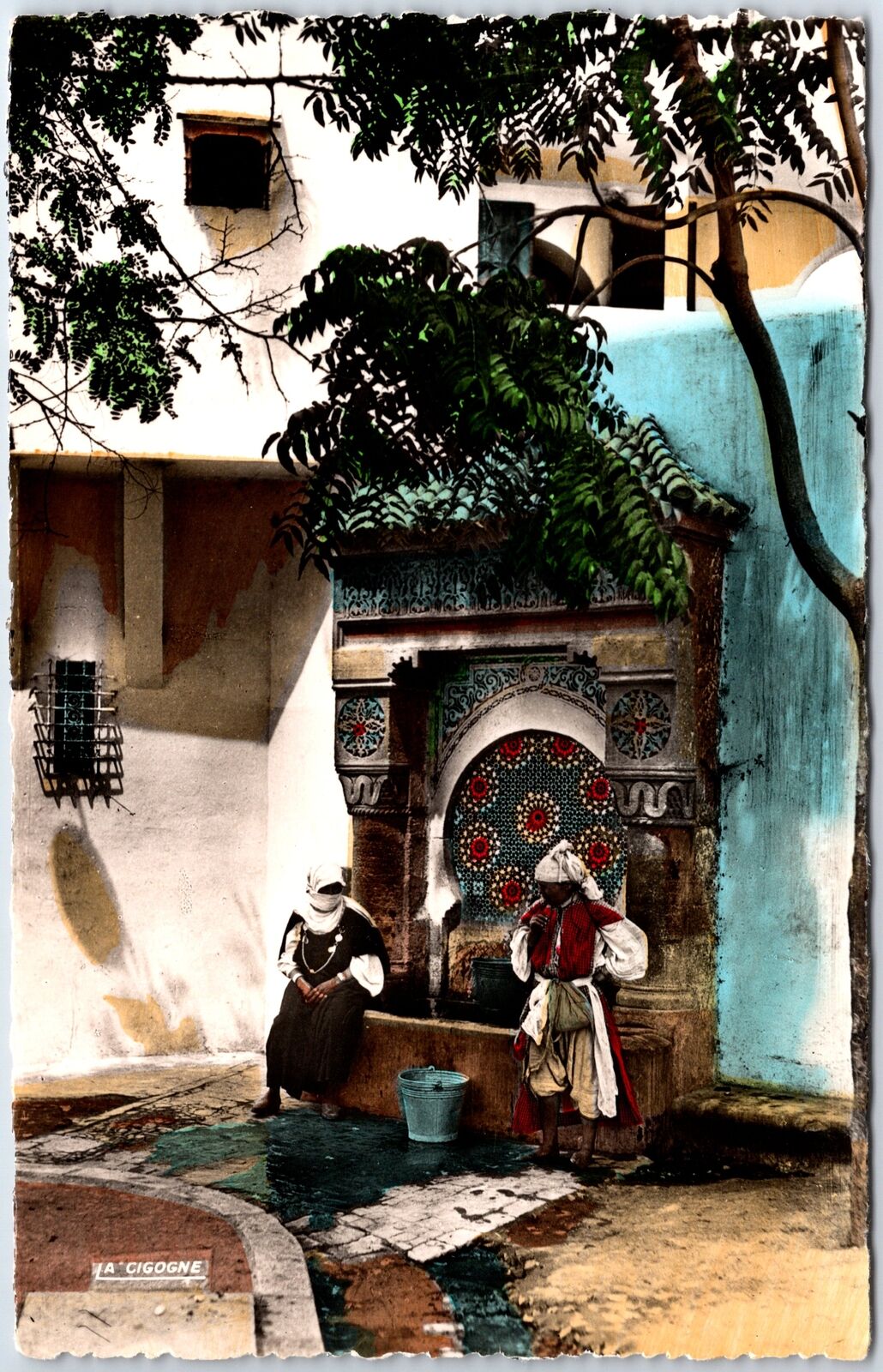 VINTAGE POSTCARD TAP WATER SCENE AT CASSBLANCE MORROCO [REAL PHOTO] RPPC