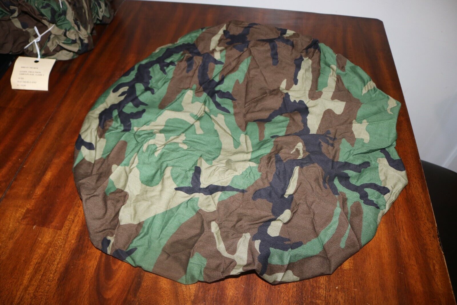 NEW unissued USGI Woodland camo field pack spare tire cover 