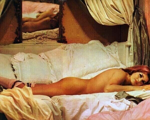Senta Berger lies on bed wearing stockings 8x10 real photo