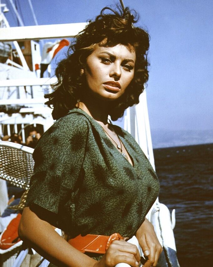 Sophia Loren beautiful 1950\'s pose in green dress on ship 24x36 inch Poster