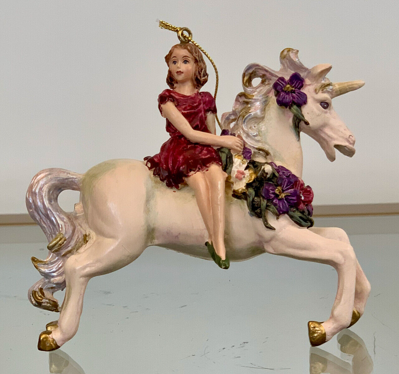 Vintage Unicorn Ornament. Fairy on it's back.  PVC / Composite material.  EUC