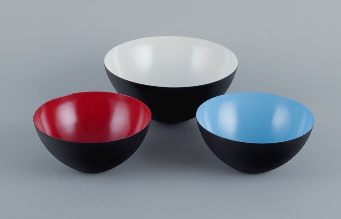 Three Krenit bowls in metal. Blue, red and white. Design by Hermann Krenchel.