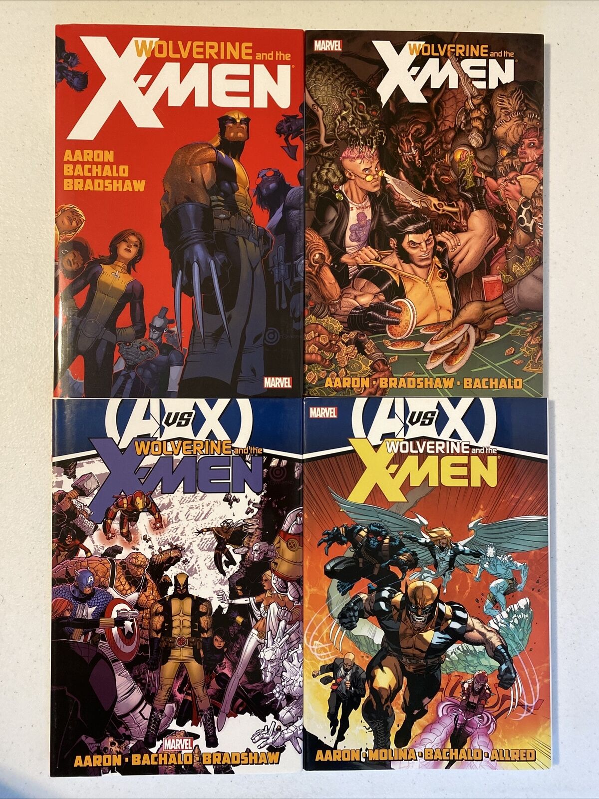 Wolverine and the X-Men Volume 1-2-3-4 (Hardcover, 2012) by Jason Aaron NM Cond.