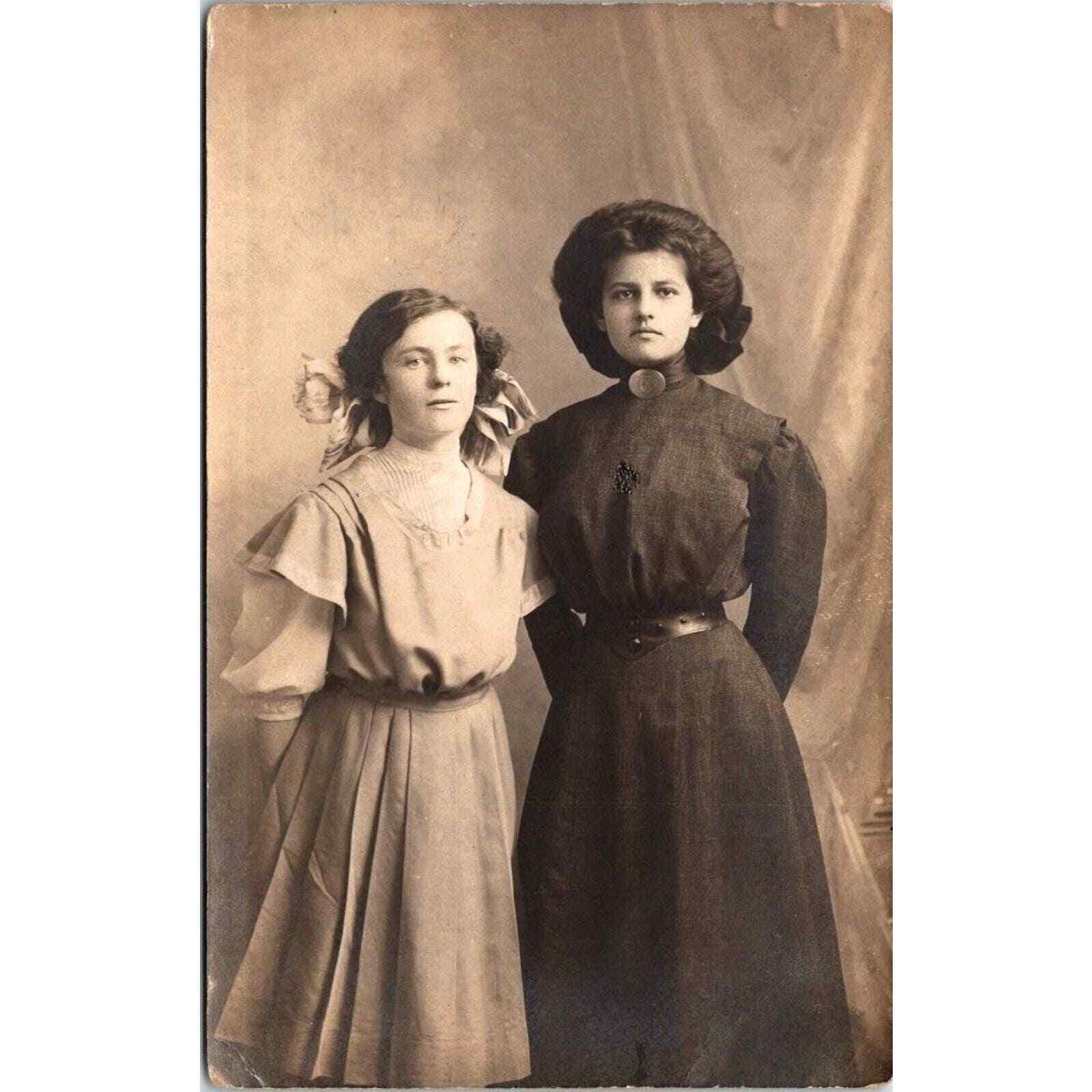 RPPC Two Women in Dresses and Bow in Hair Standing Vintage Real Photo Postcard