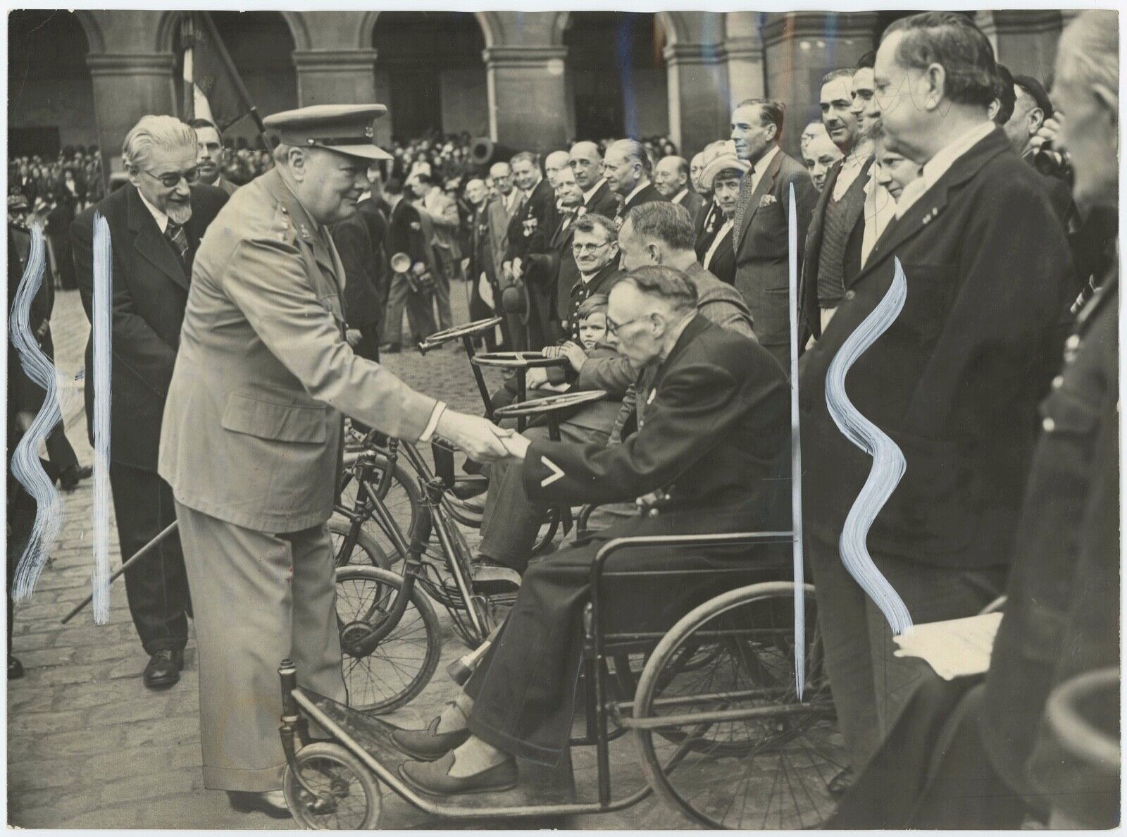 10 May 1947 press photo of Churchill meeting war-wounded veterans in Paris