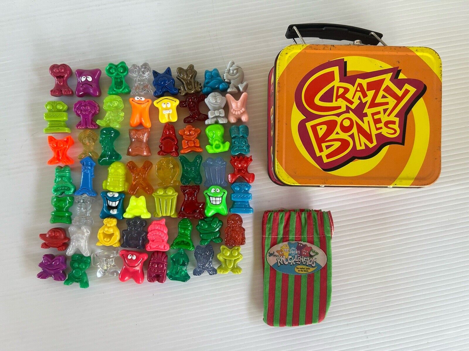 GoGo's Crazy Bones Tin Carry Case  Collector's Kit Mixed With Jacks Knuckleheads