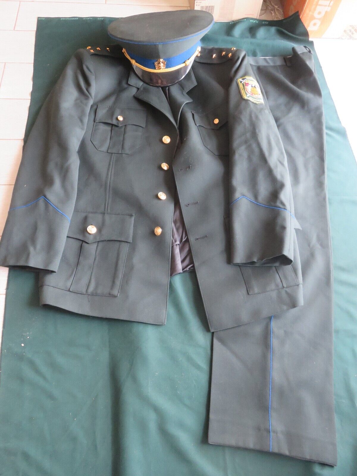 Uniform of an officer of the Legion against International Corruption Spain / Aus