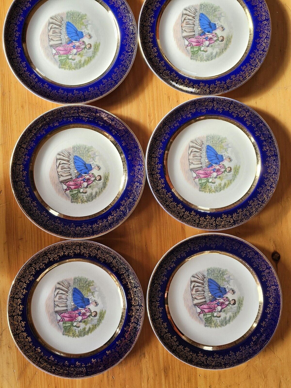 Vintage Nasco Victorian Godey 23 Karat Gold Trim Porcelain 7 piece Plate Set