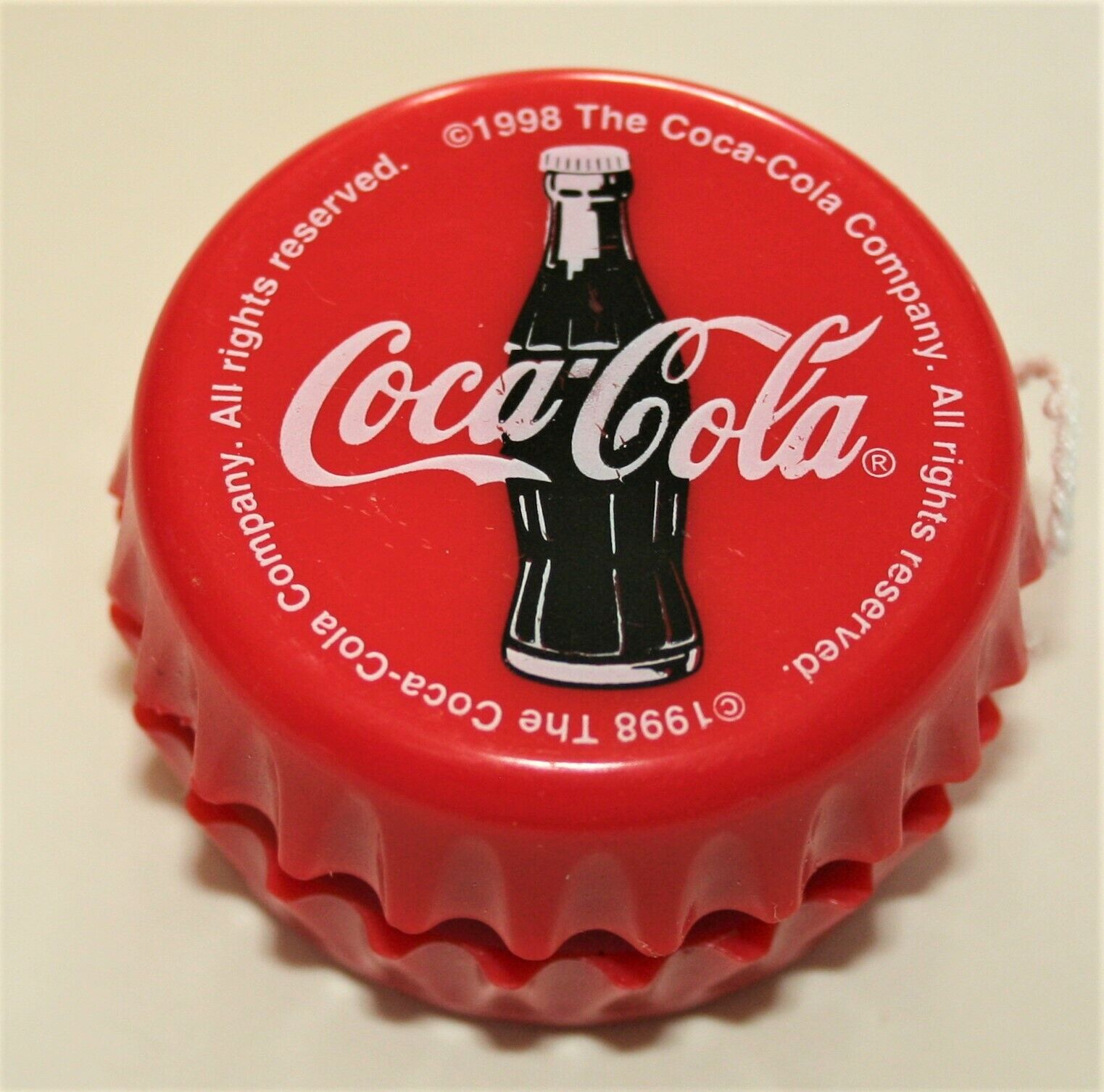 Vintage 1998 Coca-Cola Coke Bottle Cap Plastic Sleeper Yo-Yo Soda Promo NOS New