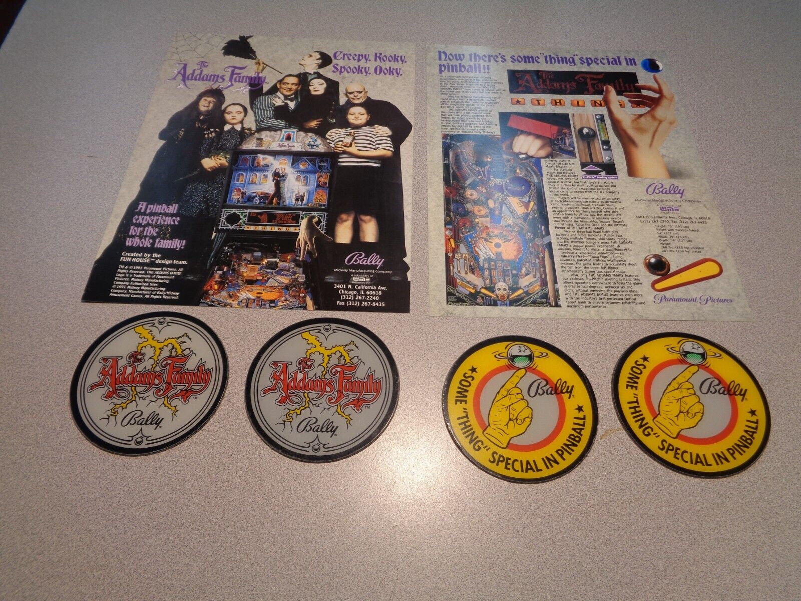 (2)-Addams Family Pinball FLYERS + (4)- Plastic Drink Coasters - ALL ORIGINAL