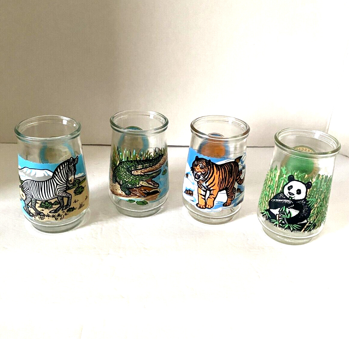 Lot 4 Vtg Welchs Jelly Jar Glasses WWF Panda Crocodile Tiger Zebra Endangered