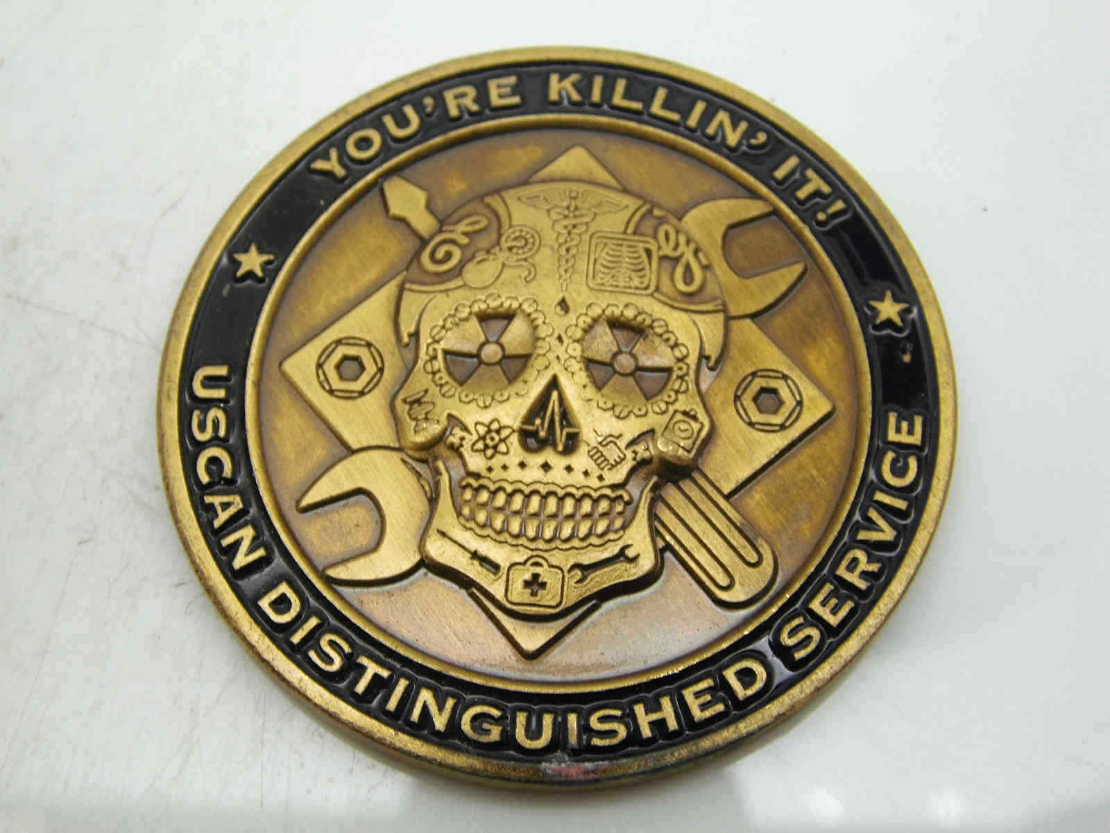 USCAN DISTINGUISHED SERVICE IMPROVING LIVES IN MOMENTS CHALLENGE COIN