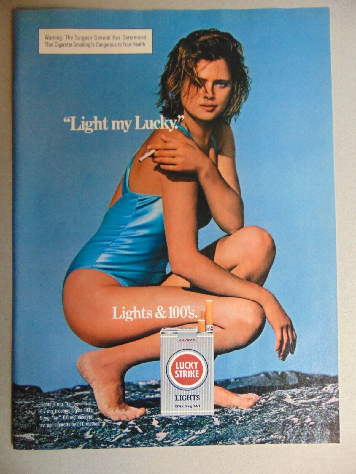 1985 LUCKY STRIKE Light My LUCKY says woman in swimsuit vintage art print ad