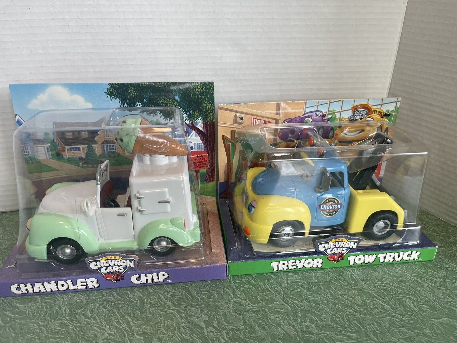 The Chevron Cars collectibles.  Lof 2 new in box