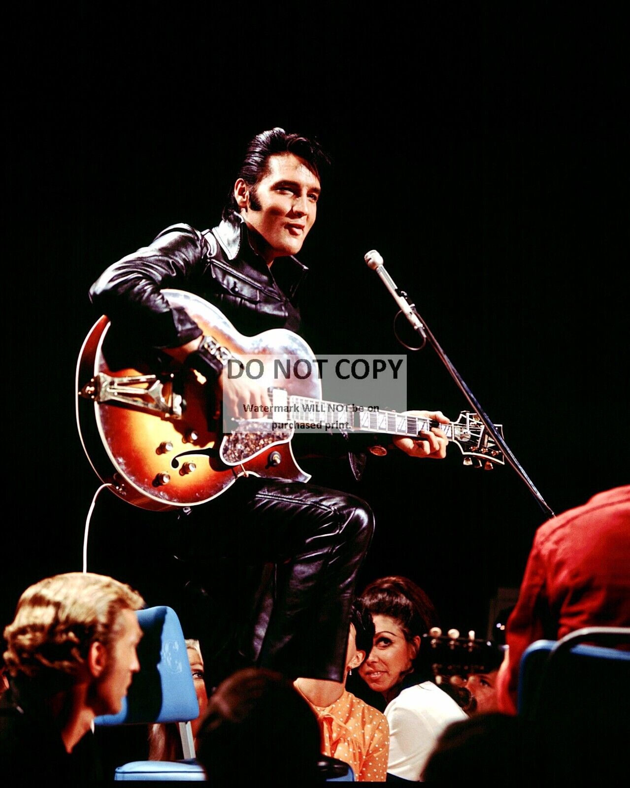 ELVIS PRESLEY PERFORMS DURING THE 