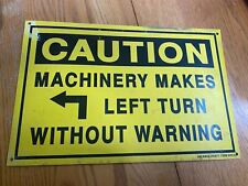 Metal Sign “Machinery Makes Left Turn Without Warning” Yellow 18 1/2.” X 12” picture
