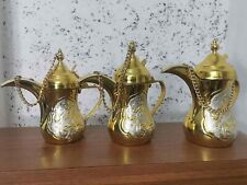 3 dallahs brass painted in color gold engraved with Arabic name (set of Dallahs) picture