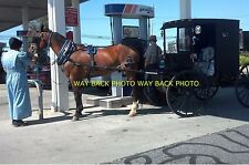 FUNNY PHOTO OF AMISH HORSE & BUGGY AT GAS STATION IN PENNSYLVANIA picture
