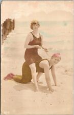 c1920s RPPC Postcard Bathing Suit Girl Riding Friend like a Horse Colored Photo picture