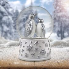 100mm Silver Penguins Playing Snow Globe by The San Francisco Music Box Company picture