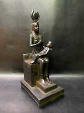 In a perfect scene ISIS the motherhood goddess breastfeeding Horus as a baby picture