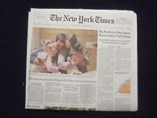 2023 NOVEMBER 26 NEW YORK TIMES-BOMBS IN URBAN AREAS RAISE CHILDREN TOLL IN GAZA picture