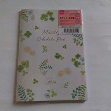 2026 A6 Monthly Planner Clover & Small Flowers Natural Design picture