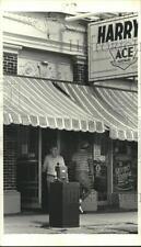1983 Press Photo Customers leaving Harry's Ace Hardware Store. - nob27927 picture
